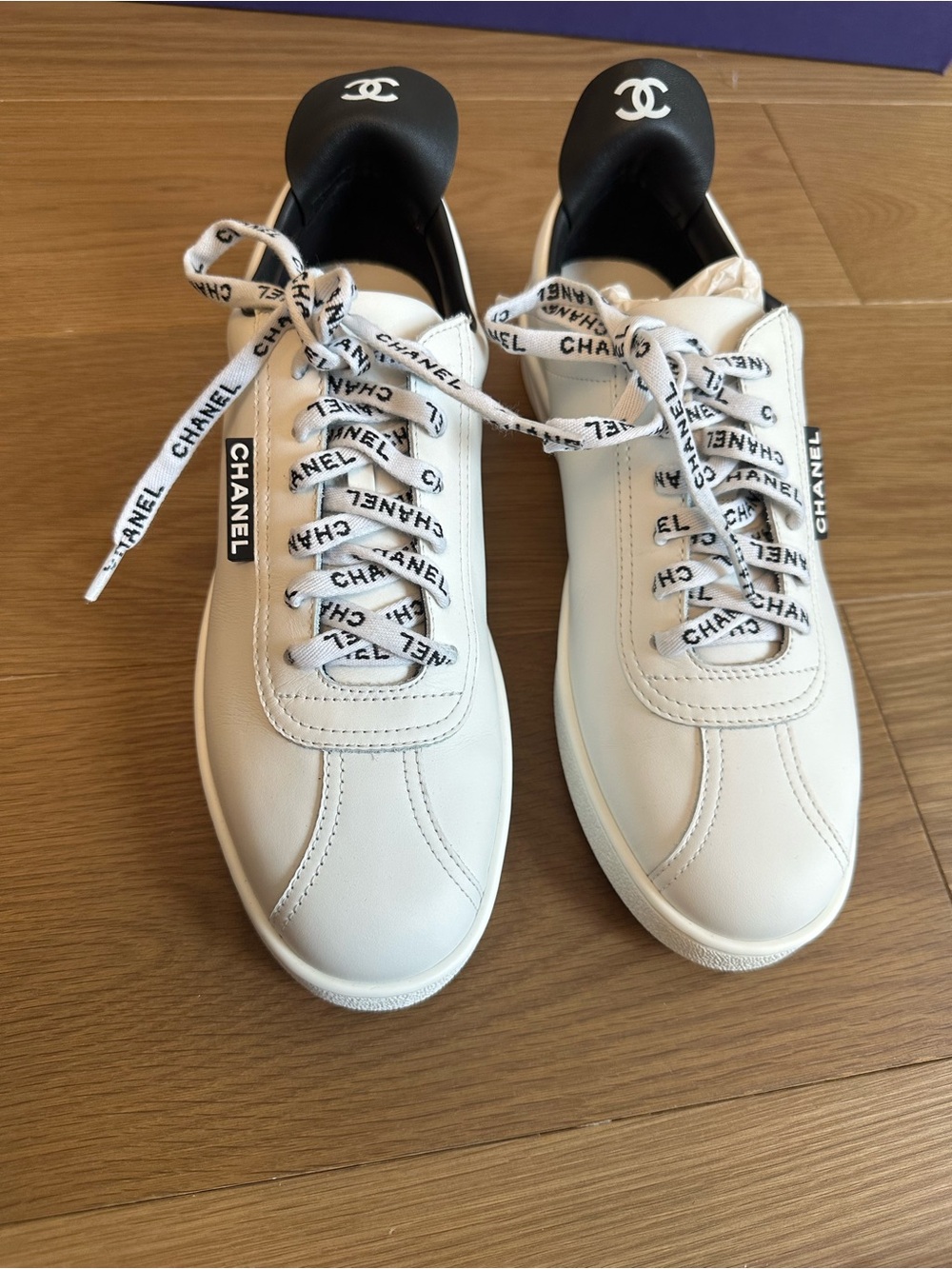 CHANEL White & Black Leather Logo Sneakers – Size 39.5 NWT